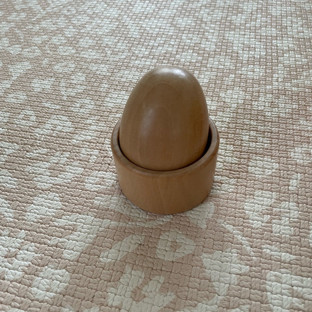 Lovevery wooden egg fine motor toy